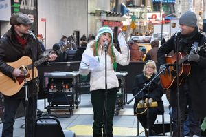 Kerry Butler sings a very "green" song with Brandon Ordell (L) and Clarke Thorell (R) Photo